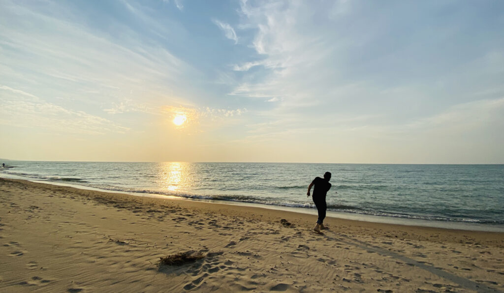 Skipping rocks at Lake Michigan